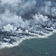 Steam produced by molten lava pouring into the North Pacific Ocean.